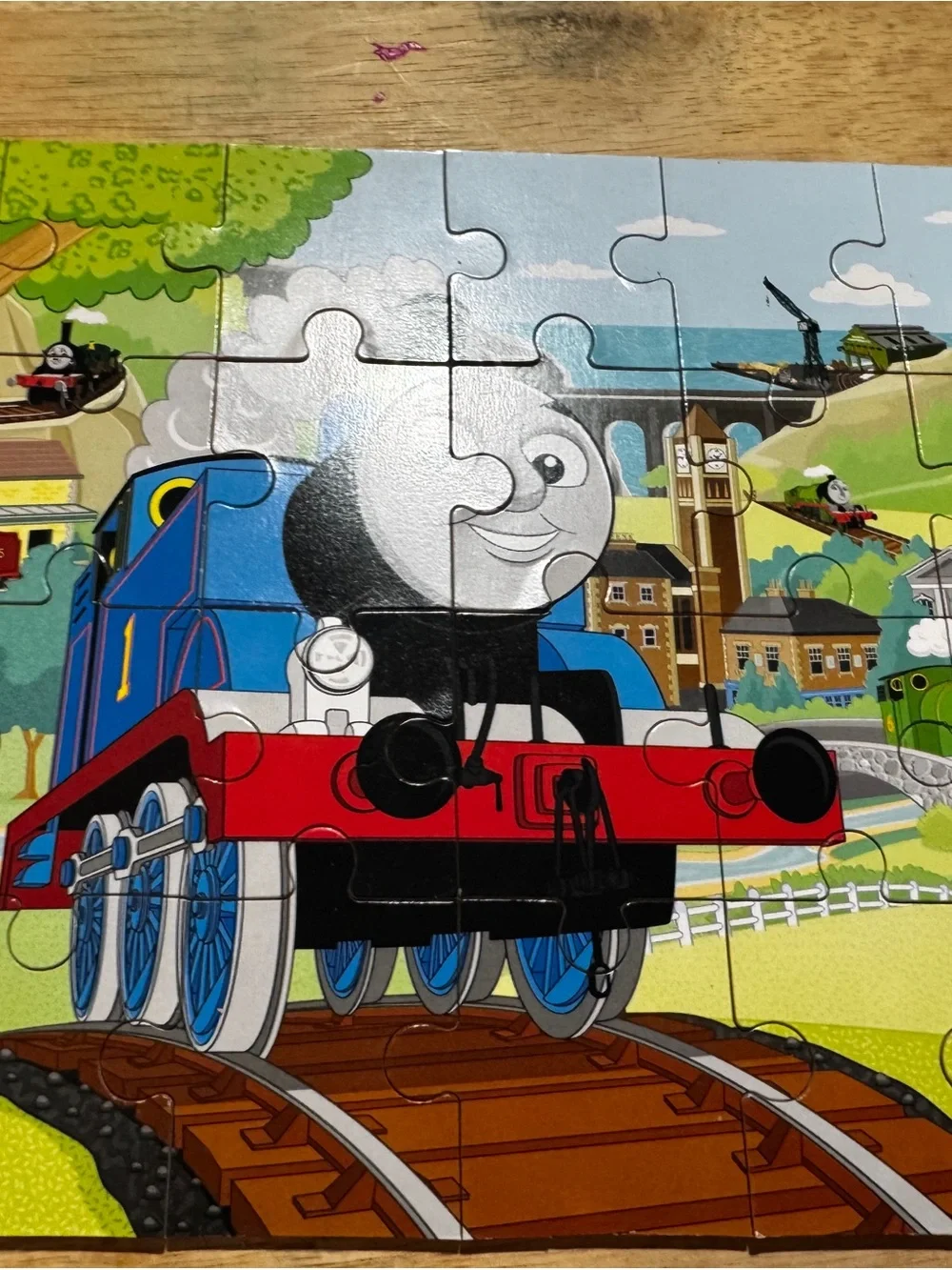 Thomas & Friends Colorful Blue Train Puzzle Pieces in Wood Organizer